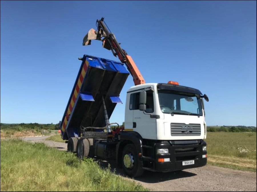 Man Grab Truck Tipper